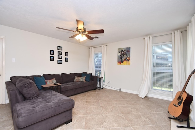 living room featuring ceiling fan