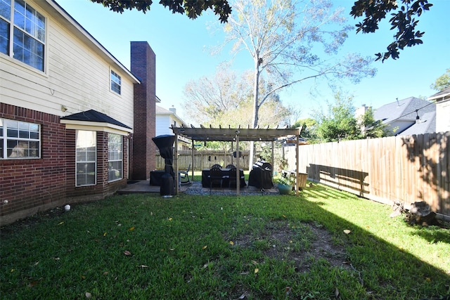 view of yard featuring a pergola and a patio area