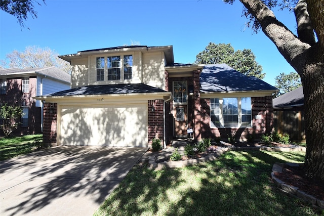 view of front of property with a front lawn and a garage