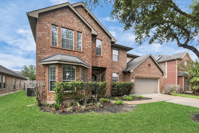 front of property featuring a garage and a front yard