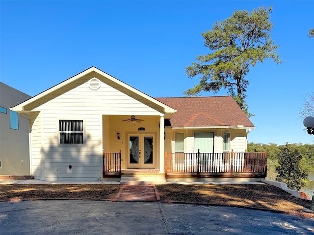 view of front of property featuring ceiling fan and a porch