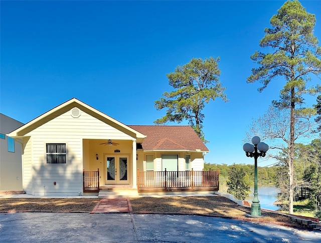 view of front of house featuring french doors, a porch, and ceiling fan