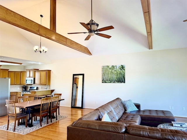113 Cottonwood Rd, Trinity, TX 75862 - living room featuring high vaulted ceiling, a ceiling fan, beam ceiling, light wood-style flooring, and a chandelier