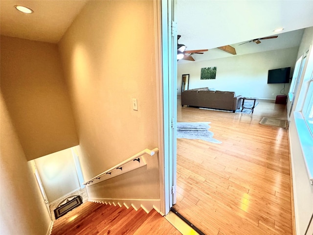 113 Cottonwood Rd, Trinity, TX 75862 - stairs featuring wood-type flooring, ceiling fan, baseboards, and recessed lighting