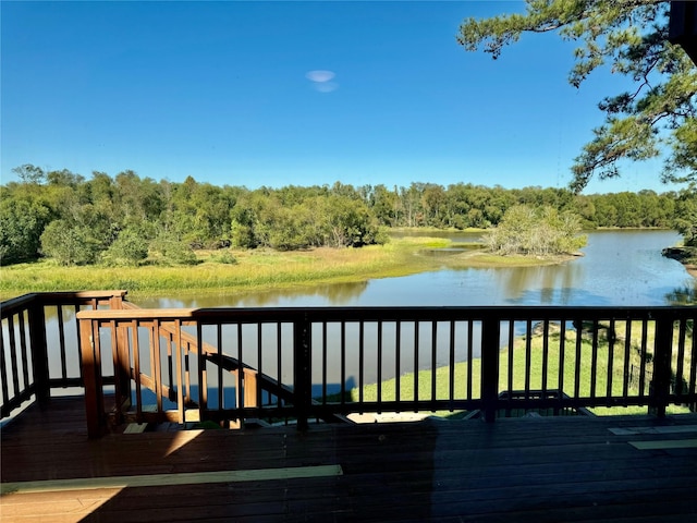 113 Cottonwood Rd, Trinity, TX 75862 - wooden terrace featuring a water view