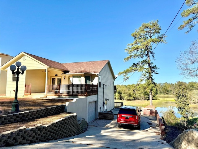 113 Cottonwood Rd, Trinity, TX 75862 - view of front of property featuring driveway, french doors, and ceiling fan