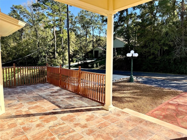 113 Cottonwood Rd, Trinity, TX 75862 - view of patio / terrace featuring view of scattered trees