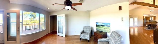 113 Cottonwood Rd, Trinity, TX 75862 - living area with lofted ceiling, wood finished floors, a ceiling fan, and baseboards