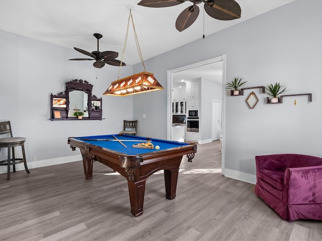 recreation room with ceiling fan, wood-type flooring, and pool table