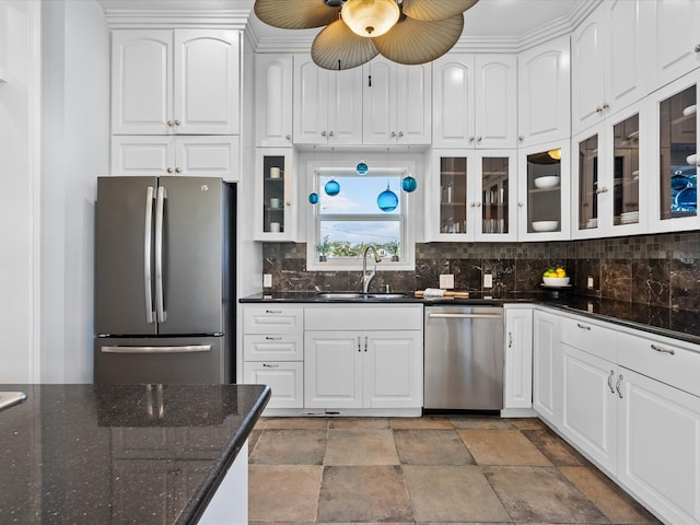 kitchen featuring sink, white cabinets, and appliances with stainless steel finishes