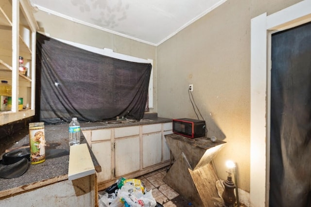 miscellaneous room featuring crown molding