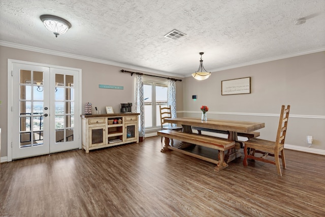 1464 Lakeside Dr W, Canyon Lake, TX 78133 - dining area with dark hardwood / wood-style floors, ornamental molding, a textured ceiling, and french doors