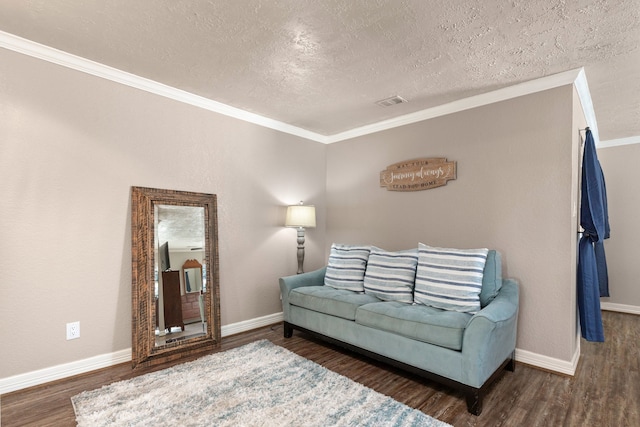 1464 Lakeside Dr W, Canyon Lake, TX 78133 - living room with a textured ceiling, dark hardwood / wood-style floors, and crown molding