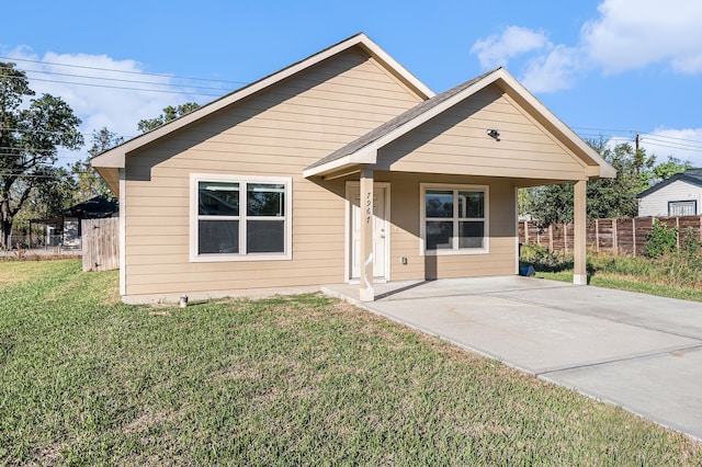 bungalow with a front lawn