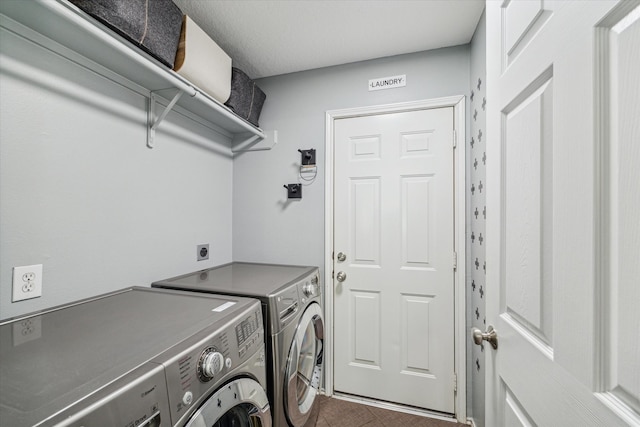 washroom featuring washer and dryer