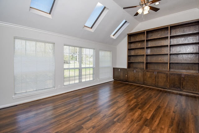 unfurnished living room featuring crown molding, dark hardwood / wood-style flooring, and vaulted ceiling