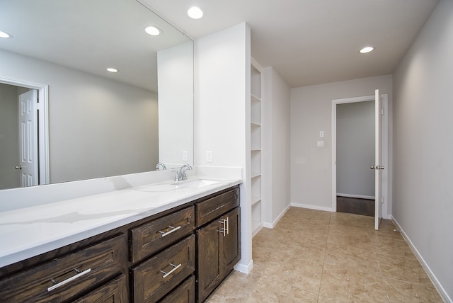 bathroom featuring tile patterned floors and vanity