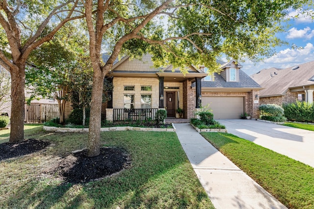 view of front facade featuring a garage and a front lawn