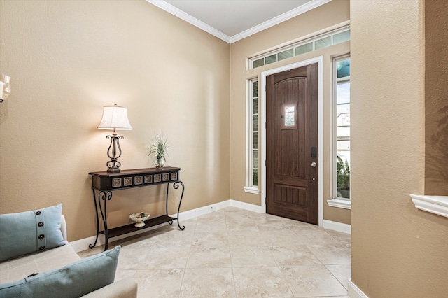 foyer featuring crown molding