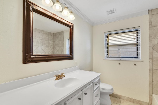 bathroom with tile patterned floors, toilet, vanity, and ornamental molding