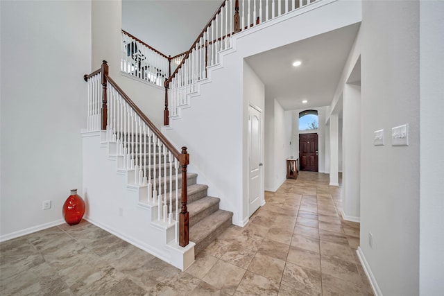 foyer entrance featuring a high ceiling