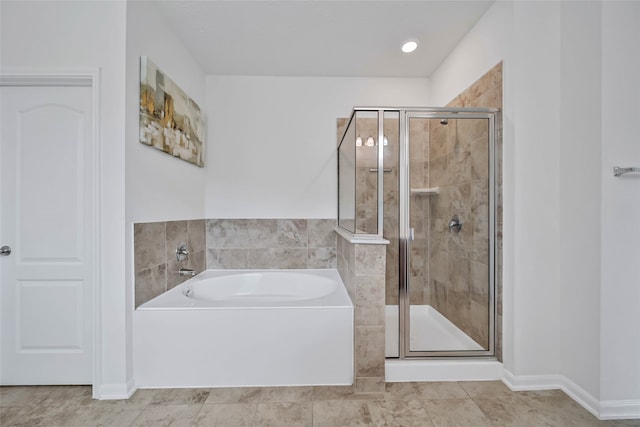 bathroom featuring plus walk in shower