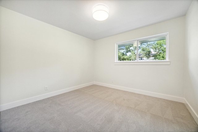 empty room featuring carpet floors