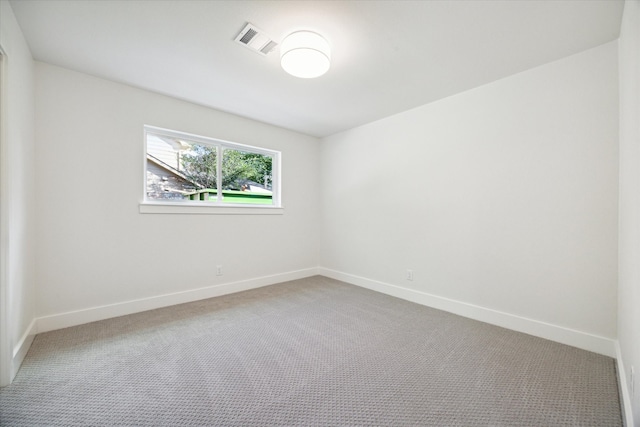 empty room featuring carpet floors