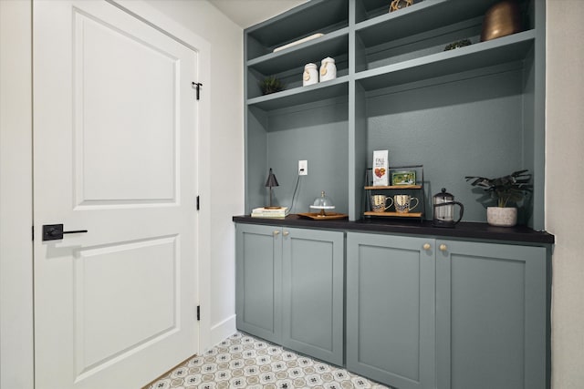 bar featuring gray cabinets