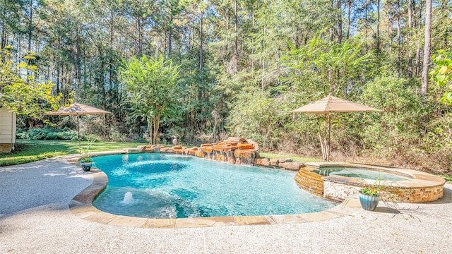 view of swimming pool with an in ground hot tub and pool water feature