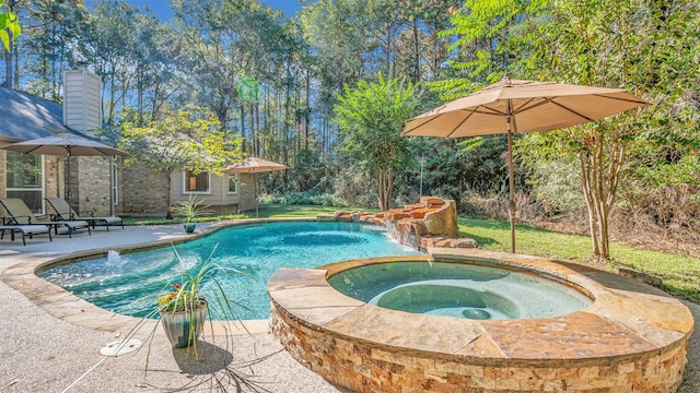 view of swimming pool featuring an in ground hot tub, a patio, and pool water feature