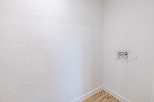 laundry area with hookup for a washing machine and wood-type flooring