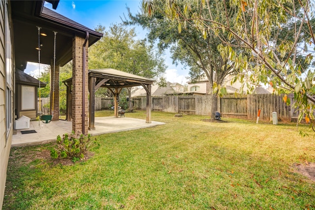 view of yard with a gazebo and a patio area