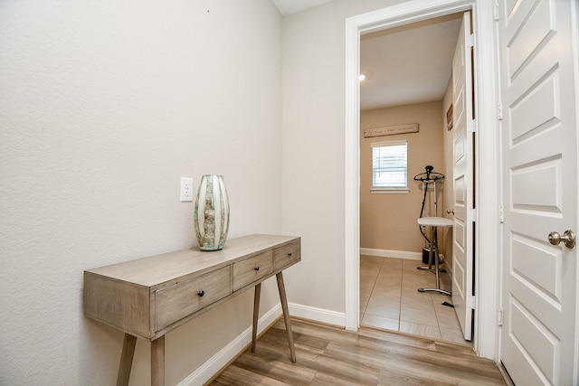 hallway featuring light hardwood / wood-style floors