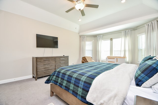 bedroom with ceiling fan and light colored carpet