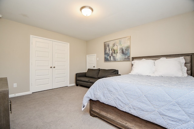 carpeted bedroom featuring a closet