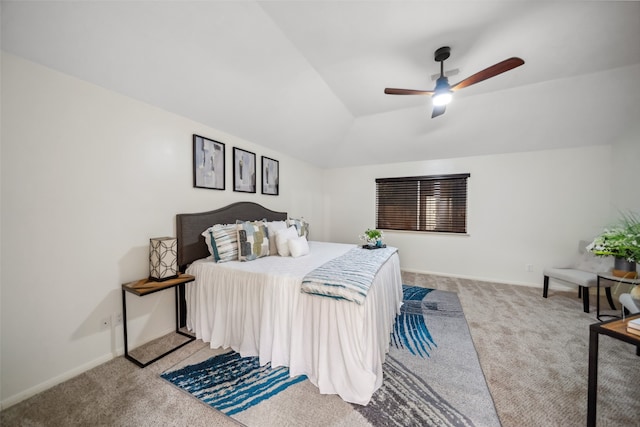 carpeted bedroom with ceiling fan and lofted ceiling