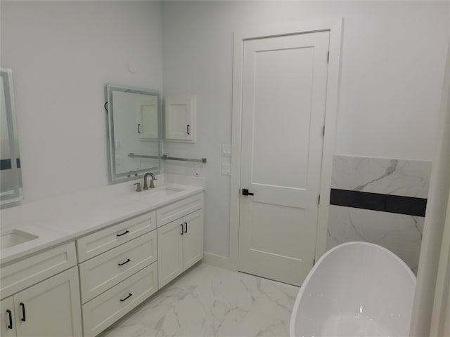 bathroom with vanity and a bathing tub