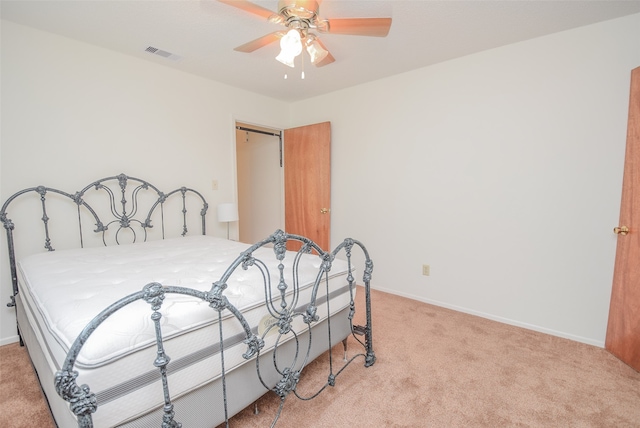 bedroom featuring carpet and ceiling fan