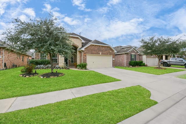 view of front of home featuring a front yard and a garage