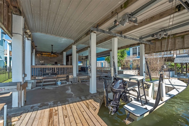 dock area with a water view