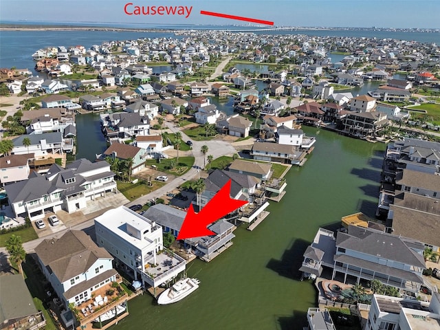 151 Bamaku Bnd, Tiki Island, TX 77554 - aerial view of residential area with a large body of water