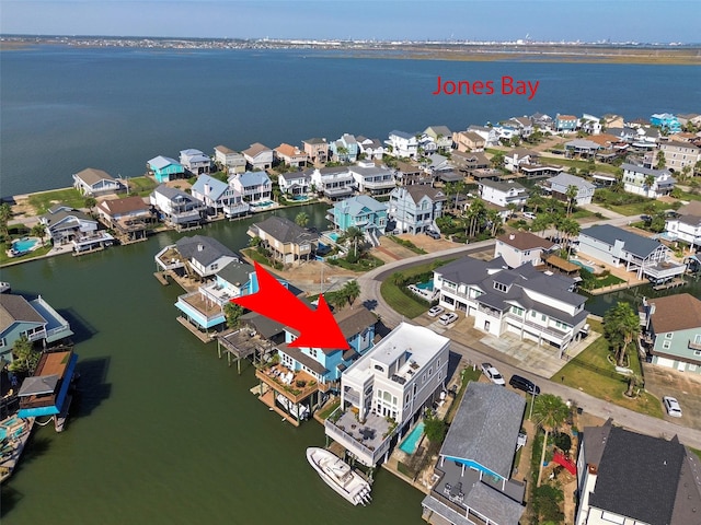 151 Bamaku Bnd, Tiki Island, TX 77554 - aerial view of residential area featuring a large body of water
