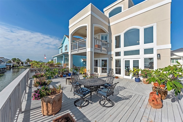 deck featuring a water view