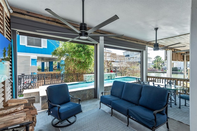 151 Bamaku Bnd, Tiki Island, TX 77554 - view of patio featuring a ceiling fan, an outdoor hangout area, and an outdoor pool