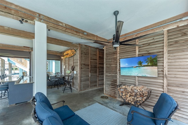 view of patio with ceiling fan