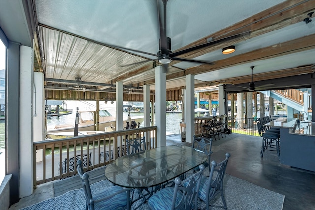 151 Bamaku Bnd, Tiki Island, TX 77554 - sunroom featuring a water view and healthy amount of natural light