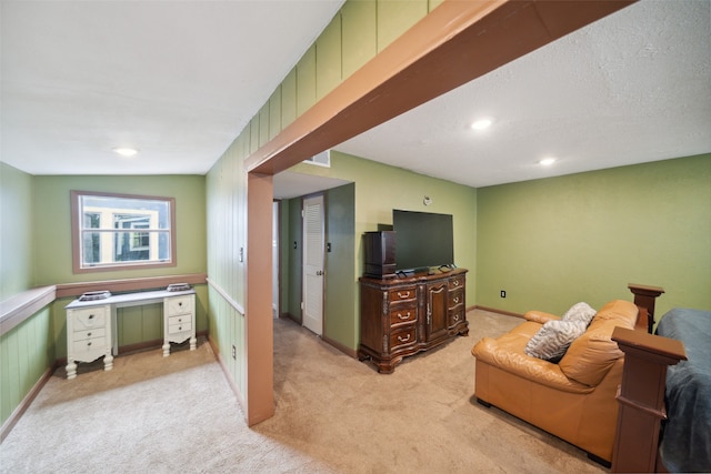 carpeted living room featuring vaulted ceiling