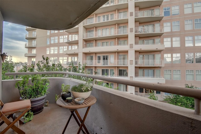 view of balcony at dusk