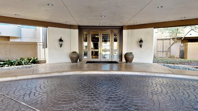 entrance to property featuring french doors